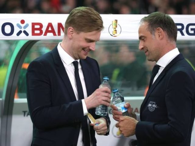 BERLIN, GERMANY - JUNE 03: Oliver Mintzlaff, CEO Corporate Projects and Investments of Red Bull reacts with Johann Plenge (L, Chief Strategy Officer of RB Leipzig after winning the DFB Cup final match between RB Leipzig and Eintracht Frankfurt at Olympiastadion on June 03, 2023 in Berlin, Germany. (Photo by Alexander Hassenstein/Getty Images)