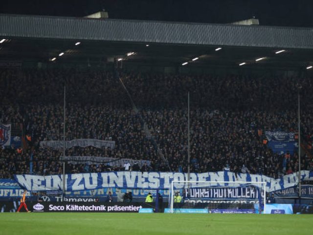BOCHUM, GERMANY - FEBRUARY 18: A general view as fans of VfL Bochum raise a banner which reads "No To Investment in the DFL" during the Bundesliga match between VfL Bochum 1848 and FC Bayern München at Vonovia Ruhrstadion on February 18, 2024 in Bochum, Germany. (Photo by Lars Baron/Getty Images)
