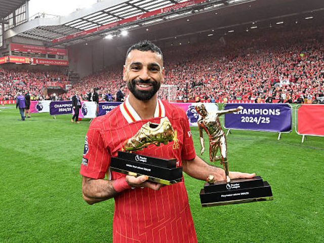 LIVERPOOL, ENGLAND - MAY 25: (THE SUN OUT. THE SUN ON SUNDAY OUT) Mohamed Salah of Liverpool poses for a photo with his Premier League Golden boot and Playmakers award after the teams 1-1 draw in the Premier League match between Liverpool FC and Crystal Palace FC at Anfield on May 25, 2025 in Liverpool, England. (Photo by Liverpool FC/Liverpool FC via Getty Images)
